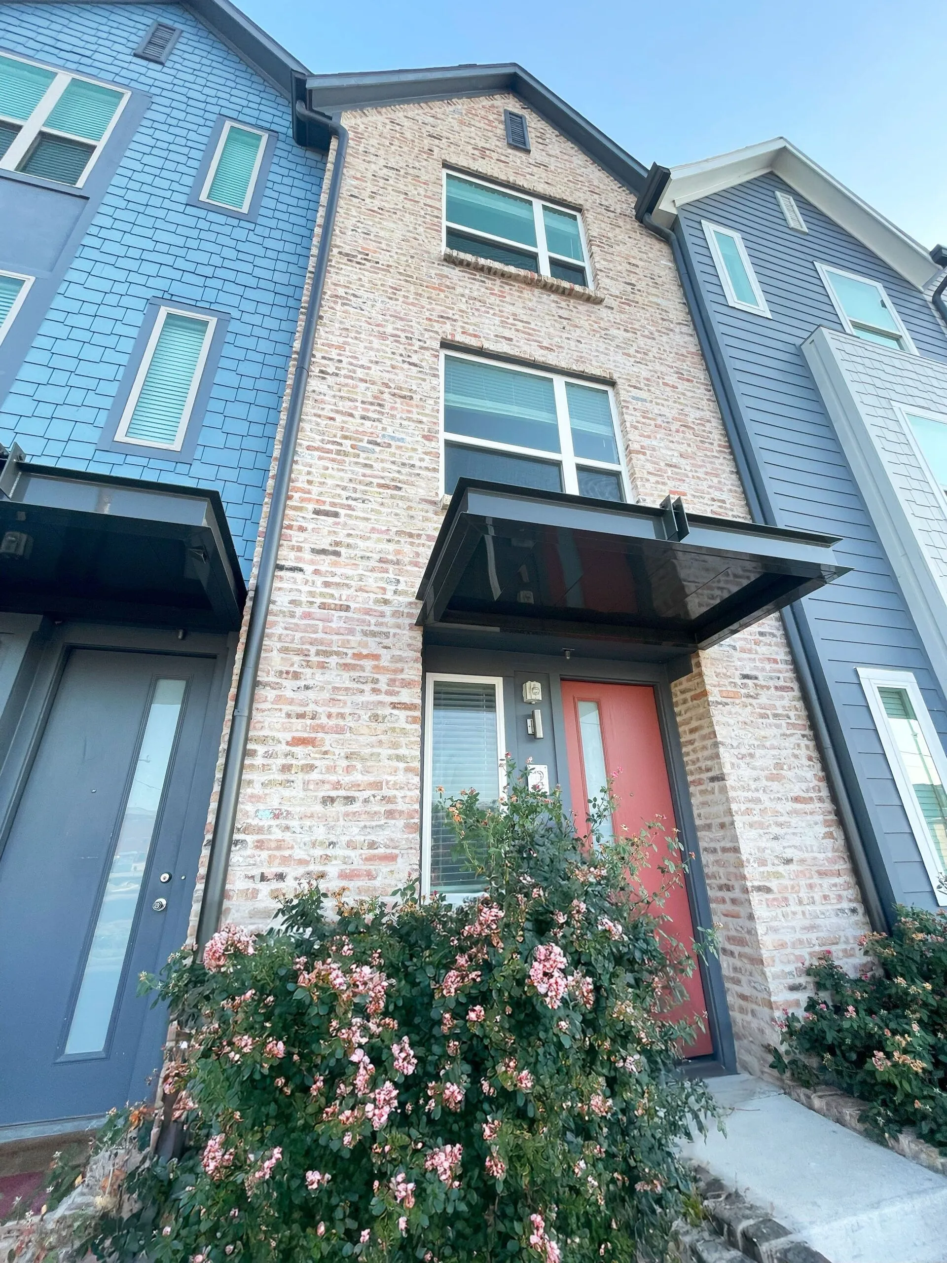An exterior photo of multiple rental properties