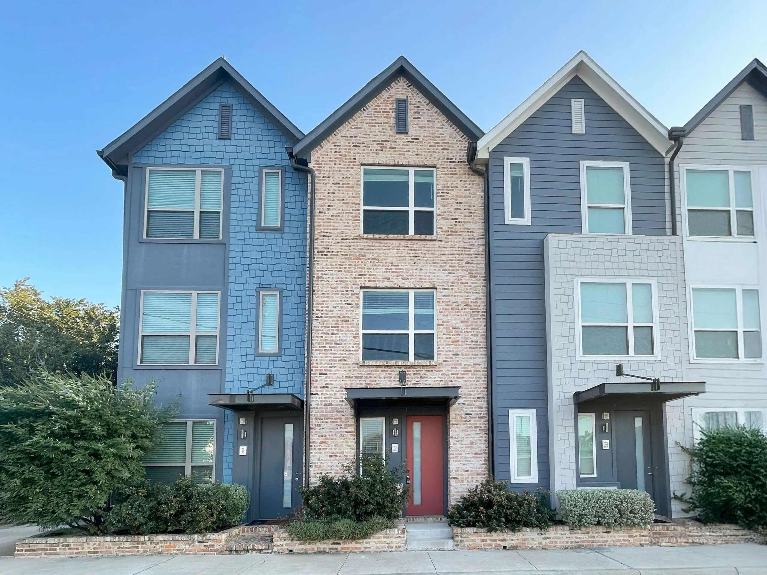 An exterior photo of multiple rental properties